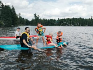 kids on paddle boards